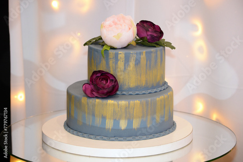 Wedding cake decoration with colorful flowers  it is served at wedding receptions. Vintage style for weddings  birthdays. 