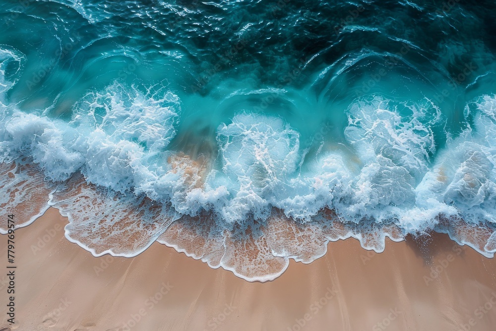 Crisp aerial shot capturing the dynamic interaction of waves crashing onto a sandy shore Crisp aerial shot capturing the dynamic interaction of waves crashing onto a sandy shore