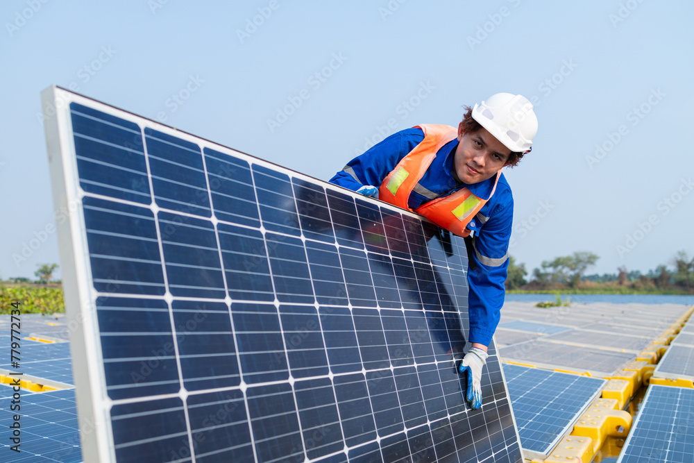 Technician Adjusting Solar Panel at Installation Site Technician Adjusting Solar Panel at Installation Site