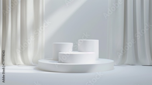 Minimalist white podiums with drapery background in soft lighting