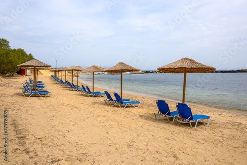 Sun loungers on sandy Limnionas beach. Kos island  Dodecanese  Greece