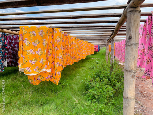 Drying colored cloth after dyeing. fabric making in Klaten. photo