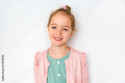 Cute girl 4 year old posing in studio