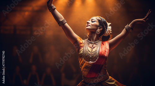 Portrait of a female performing bharatnatyam dance wearing ethnic jewellery and saree photo
