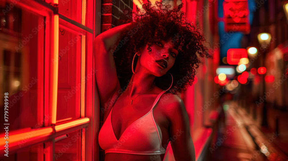 Female sex worker standing near the window - red light district concept - obrazy, fototapety, plakaty 