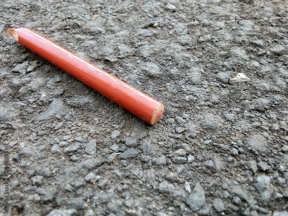 color pencils on asphalt background. color pencils on asphalt background.