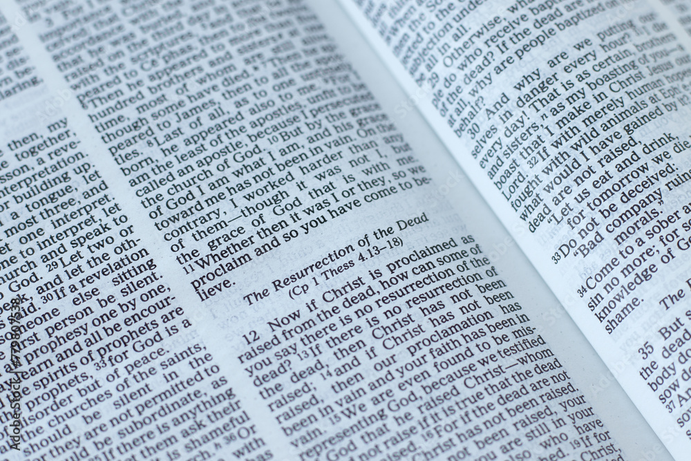 Christian resurrection verses in open holy bible book. Biblical concept of eternal life, hope and faith in God Jesus Christ. Christian resurrection verses in open holy bible book. Biblical concept of eternal life, hope and faith in God Jesus Christ.