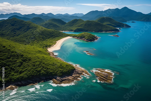 Aerial view of the beautiful coastline with lush green mountains and sandy beaches in Brazil