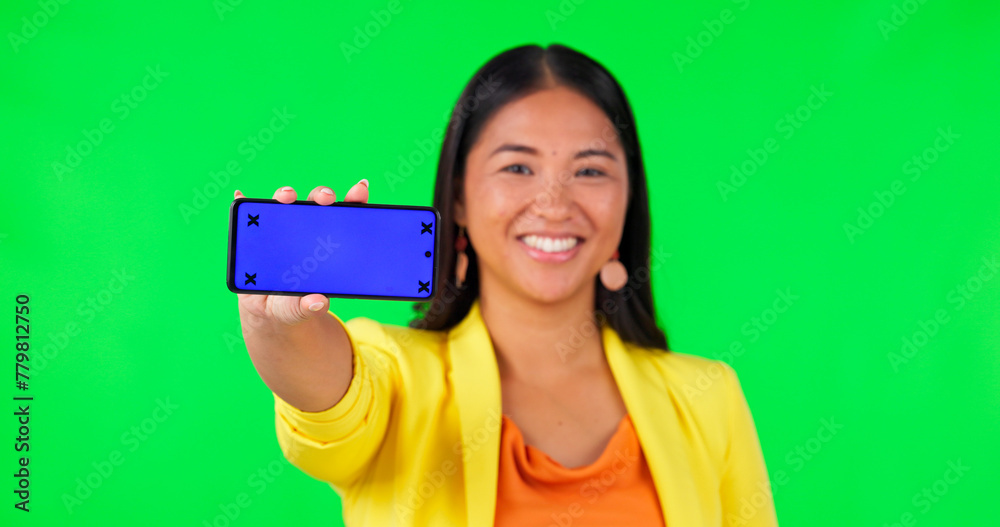 Green screen, phone screen and woman face with thumbs up for yes, vote or social media review on studio background. Portrait, smile and asian lady with emoji hand or smartphone networking promo offer Green screen, phone screen and woman face with thumbs up for yes, vote or social media review on studio background. Portrait, smile and asian lady with emoji hand or smartphone networking promo offer