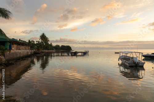 An idyllic evening vista of the lagoon that surrounds the lush South Pacific island of Mo'orea, French Polynesia.