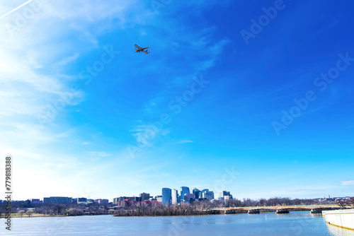 cityscape of Washington, DC. The sky above downtown Washington is reflected in the Potomac River.