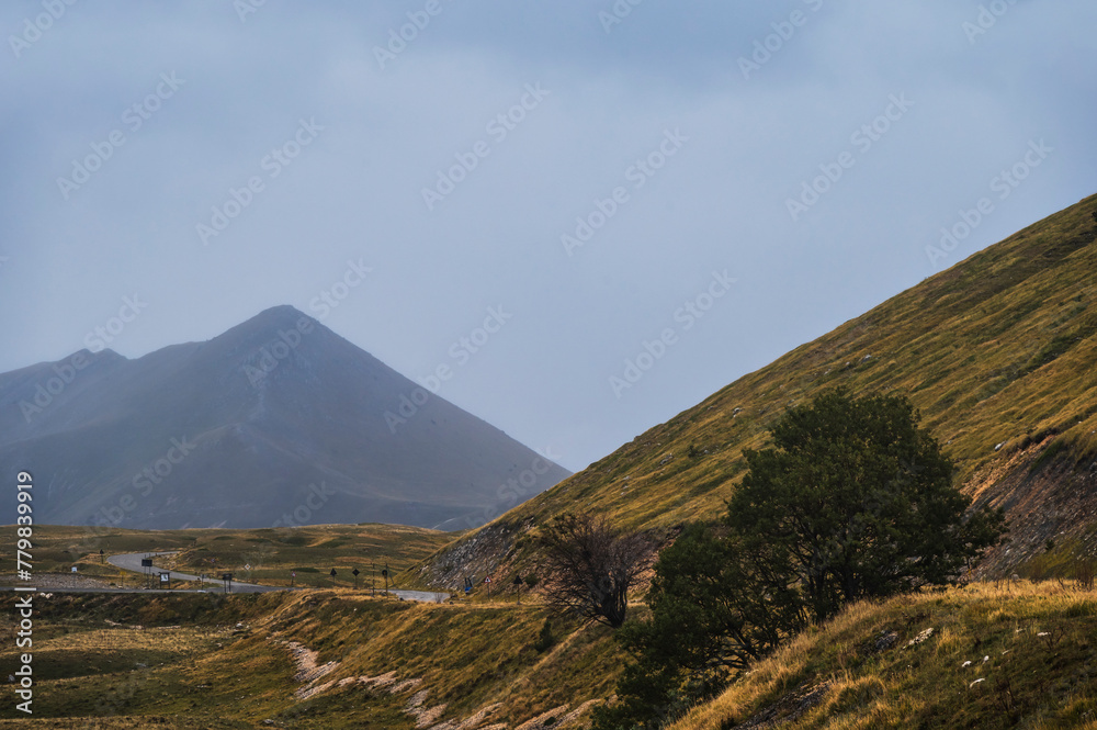 landscape inside Campo imperatore during an autumnal cloudy day, Parco nazionale del Gran Sasso, L'Aquila, Italy landscape inside Campo imperatore during an autumnal cloudy day, Parco nazionale del Gran Sasso, L'Aquila, Italy