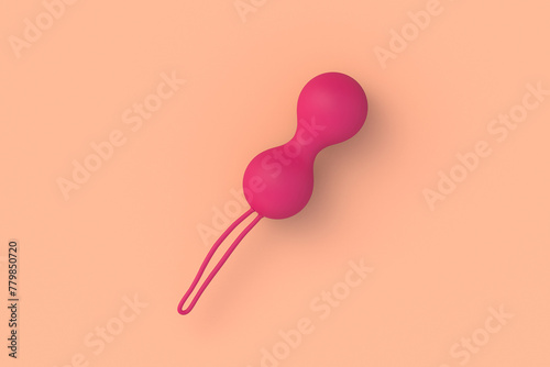 One vaginal sex toy on beige background. Geisha balls. Desire and orgasm. Sex shop product. Female masturbation accessory. Top view. 3d render photo