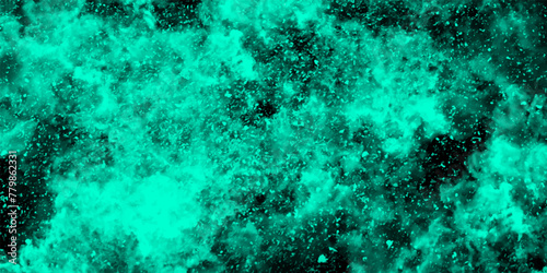 Abstract dynamic particles with soft blue clouds on dark background. Space hand painted watercolor background with aquarelle light mint color splash. Watercolor fantastic and grungy background. 