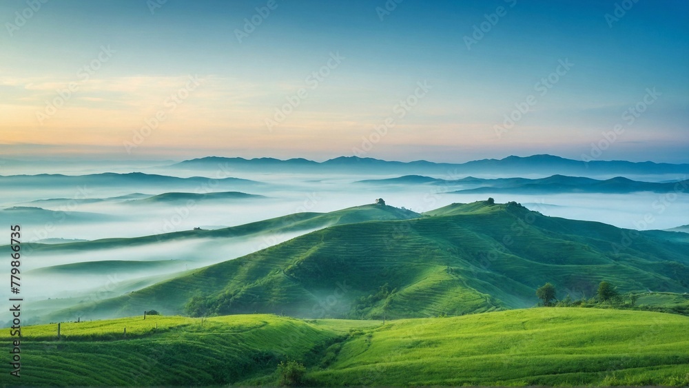 Green Hills Surrounded by Mist Against a Blue Sky, Reflecting the Peace and Serenity of Nature  Beauty