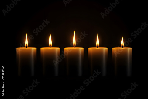 Group of litting candles isolated on black background