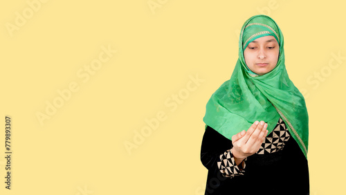 Beautiful Young Muslim Woman in Aadab Pose, Copy Space