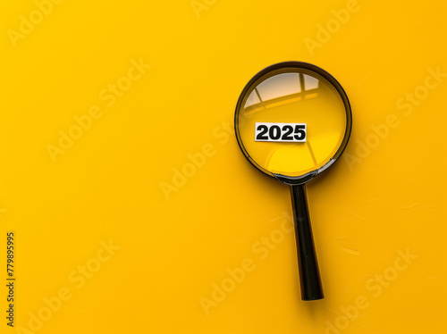Magnifying glass highlighting 2025 on a target, over a vibrant yellow backdrop, illustrating precision in future goals