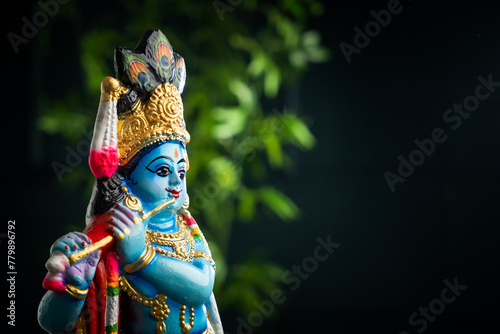 Beautiful sculpture of Lord Krishna , Vishu festival background