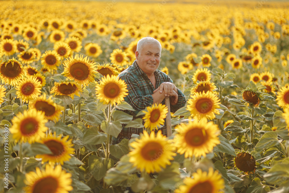 Glad Harvest Moments Elderly Worker Smiling at Camera Glad Harvest Moments Elderly Worker Smiling at Camera