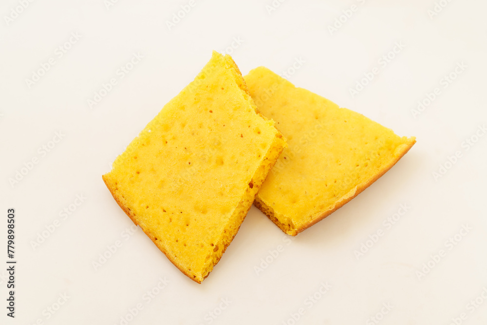 Corn tortillas and ingredients on white background