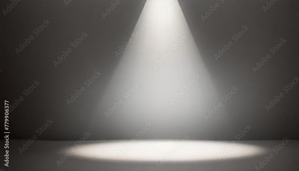 Defocused view on empty studio background lit from top by round spotlight. Visible light cone. Place for displaying product Defocused view on empty studio background lit from top by round spotlight. Visible light cone. Place for displaying product