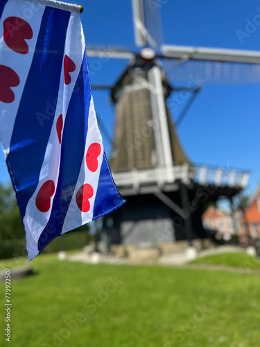 Frisian flag at the windmill in Sloten