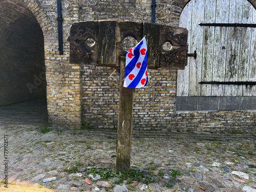 Scaffold with Frisian flag in Sloten photo