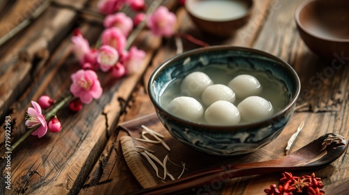 Traditional dinner dish rice ball Tangyuan during family gathering party to celebrate Chinese lunar new year.