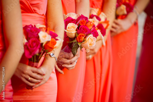 Bridesmaid holding rose bouquet