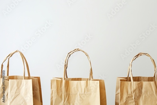 Eco-friendly recycled paper bags on a clean background