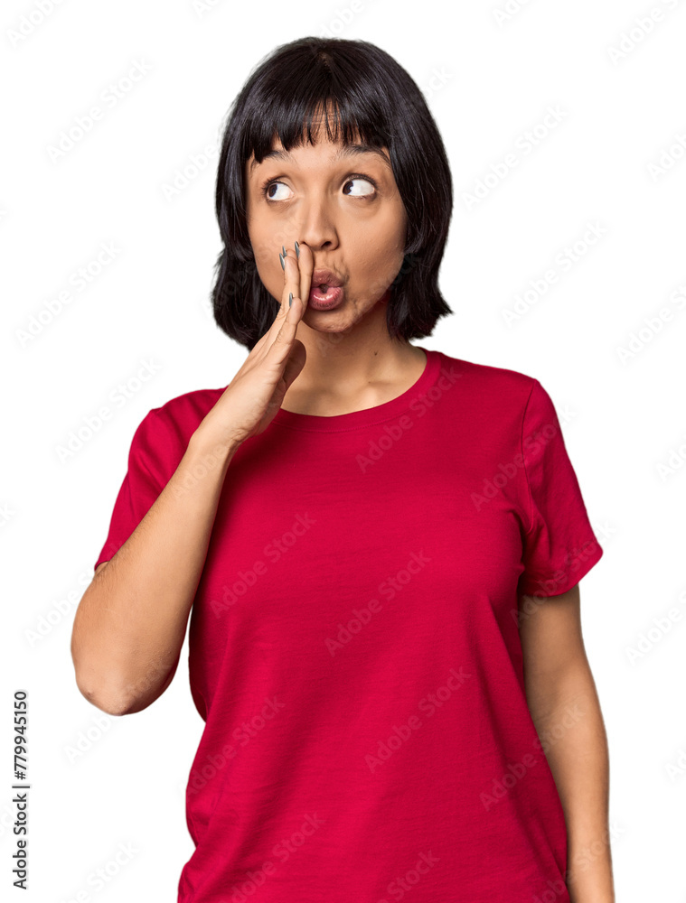 Young Hispanic woman with short black hair in studio is saying a secret hot braking news and looking aside Young Hispanic woman with short black hair in studio is saying a secret hot braking news and looking aside