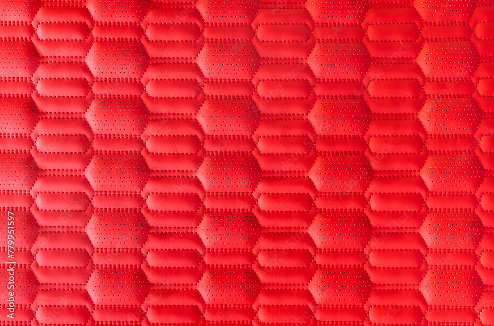 Naklejka premium red leather background and texture as a pattern for the interior car or a sofa or wall covering