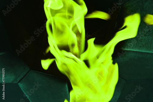 Green neon abstract smoke, flames on a dark background.