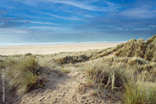 Fototapeta Naklejka Na Ścianę i Meble -  Cornish Beach - Scenic Sandy Shoreline and Sand Dunes in Cornwall, UK