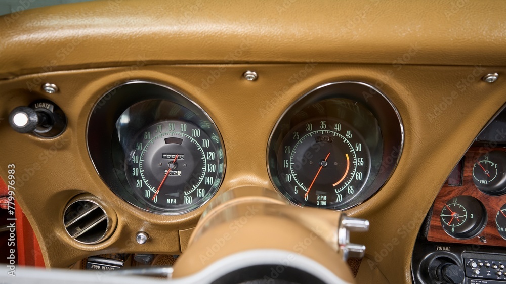 Speeedometer and tachometer inside a car Speeedometer and tachometer inside a car