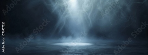 A dark, foggy background with a single spotlight illuminating a blank space in the center.