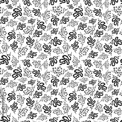 Black and white drawing of snakes arranged in seamless pattern. A group of freehand drawn snakes that vary in size are swarming and rotating across a white backdrop.