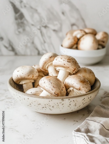 A minimalist kitchen scene featuring a bowl of fresh mushrooms ready for cooking, in honor of Mushroom Day