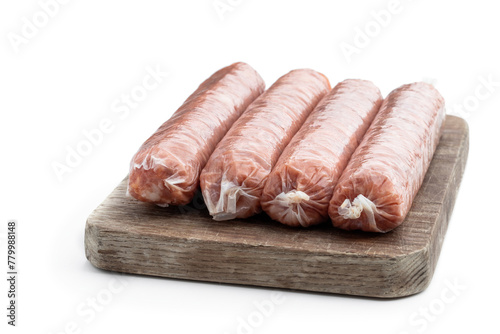 Raw pork sausages isolated on white background