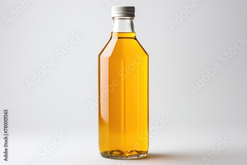 Plastic bottle of fresh apple juice on white background isolated