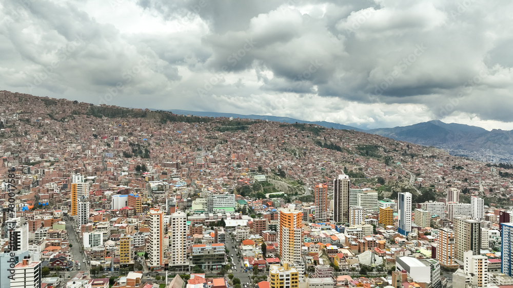 La Paz, Bolivia, aerial view flying over the dense, urban cityscape
