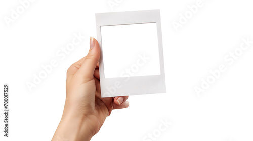 hand holding a empty polaroid photo template. blank photo frame mockup. Vintage Card on transparent background