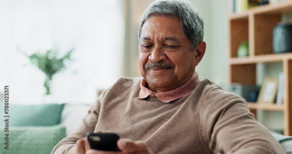 Phone, communication and senior man on sofa with smile, online chat and scroll on internet in home. Connection, networking and happy old person on couch with smartphone for mobile app, news or typing