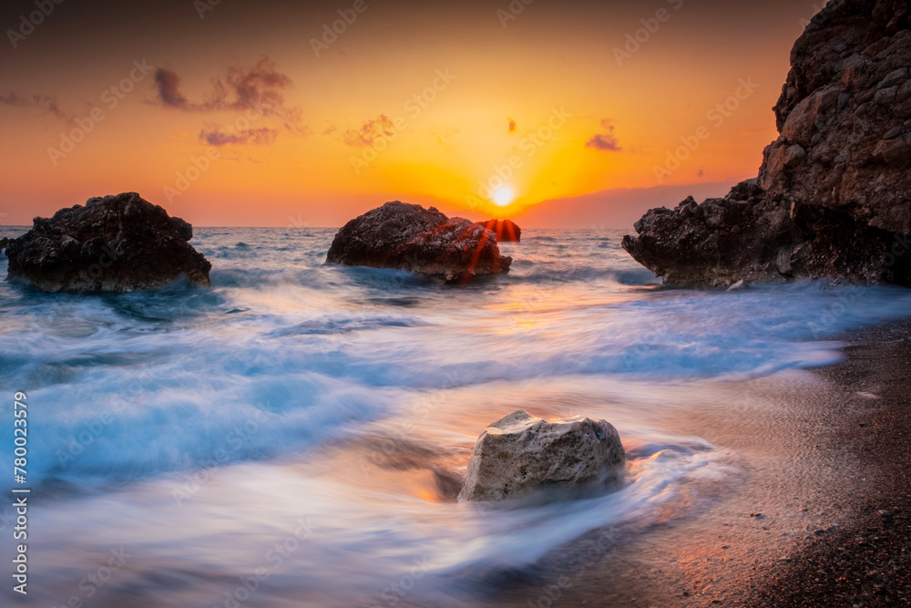 rocks on the sea and beautiful sunset sky view