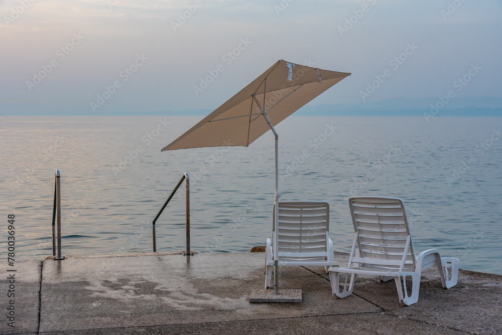 Metal steps leading to the Adriatic sea at the port of Piran, Slovenia Metal steps leading to the Adriatic sea at the port of Piran, Slovenia