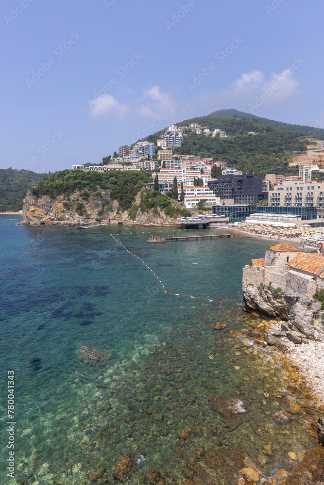 View of seaside by Adriatic Sea with Ricardova Glava Beach located at the City Walls, Budva, Montenegro