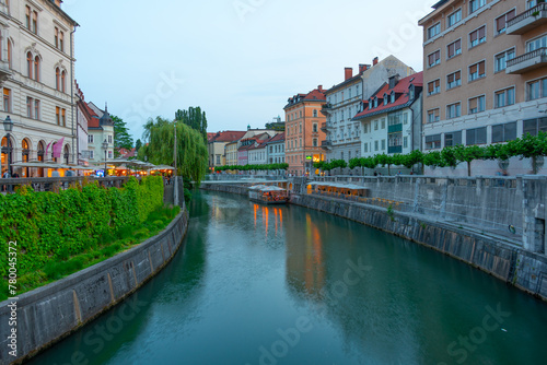 Sunset view of riverside of Ljubljanica river in Ljubljana, Slov photo