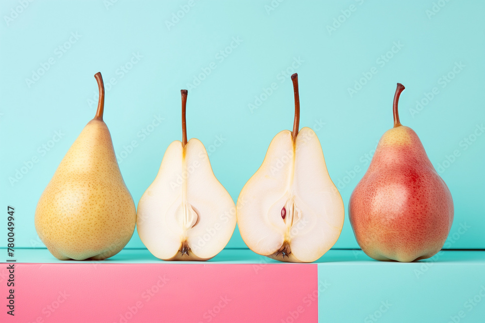 Fresh Whole and Halved Pears on Colorful Background Fresh Whole and Halved Pears on Colorful Background