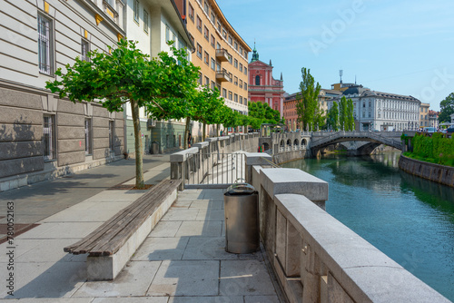 Franciscan Church of the Annunciation ant the riverside of Ljubl photo